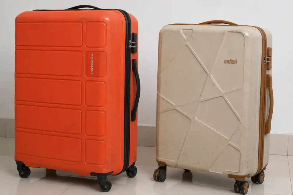10 Suitcases on glossy tiled floor